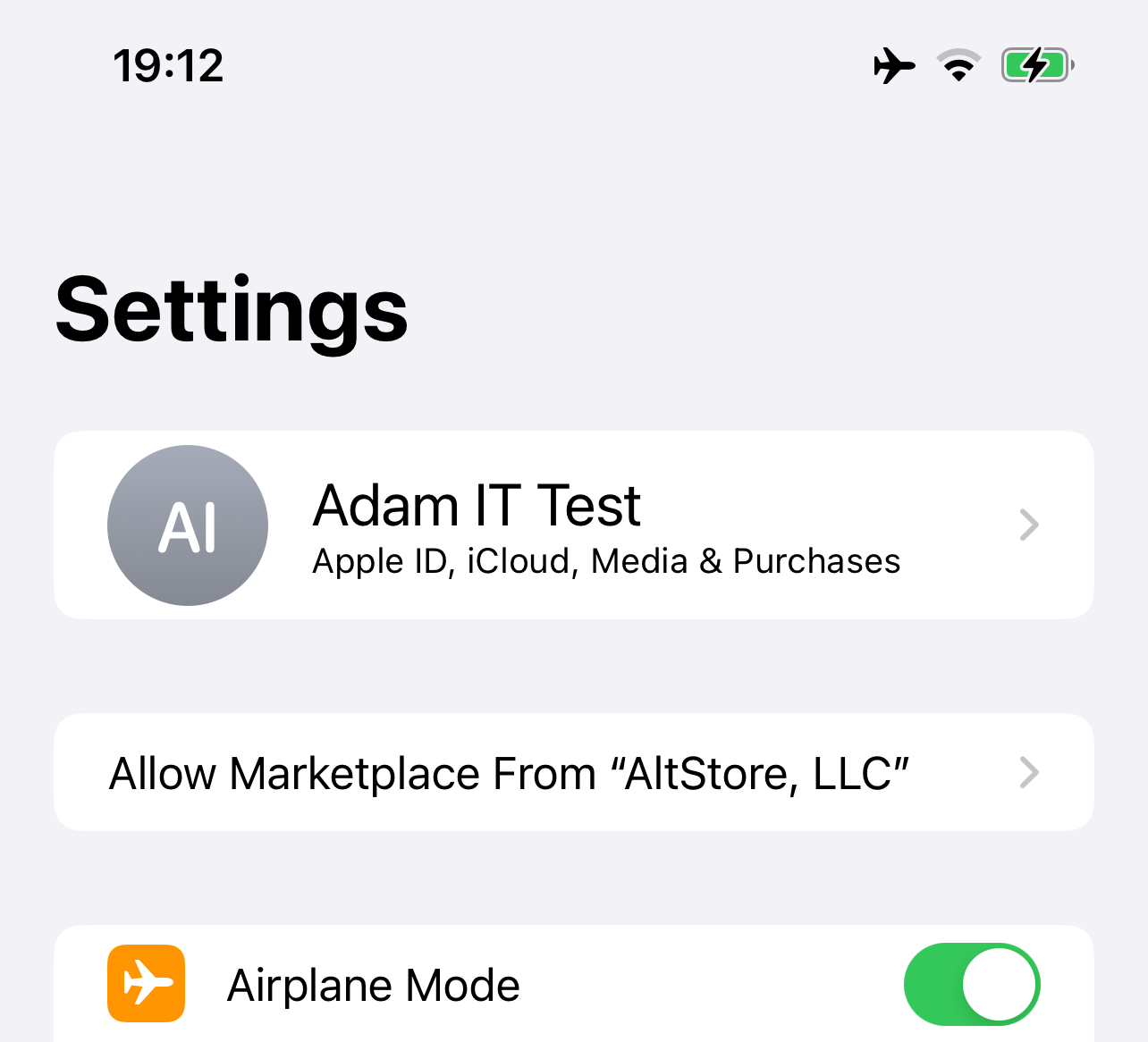 A button has appeared in the iOS Settings app, below the Apple ID button. It says: Allow Marketplace From “AltStore, LLC”